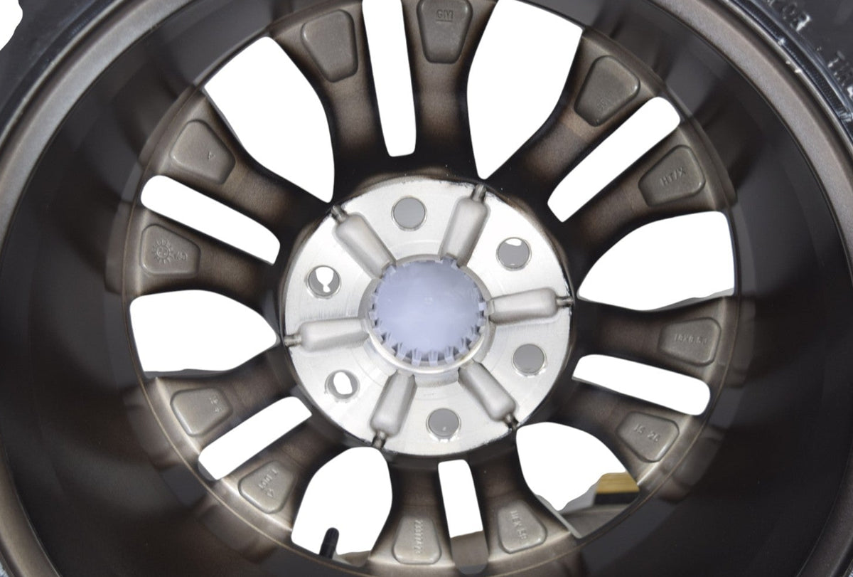 18" GMC Sierra Yukon OEM Wheels Rims Tires Satin Graphite Goodyear MT