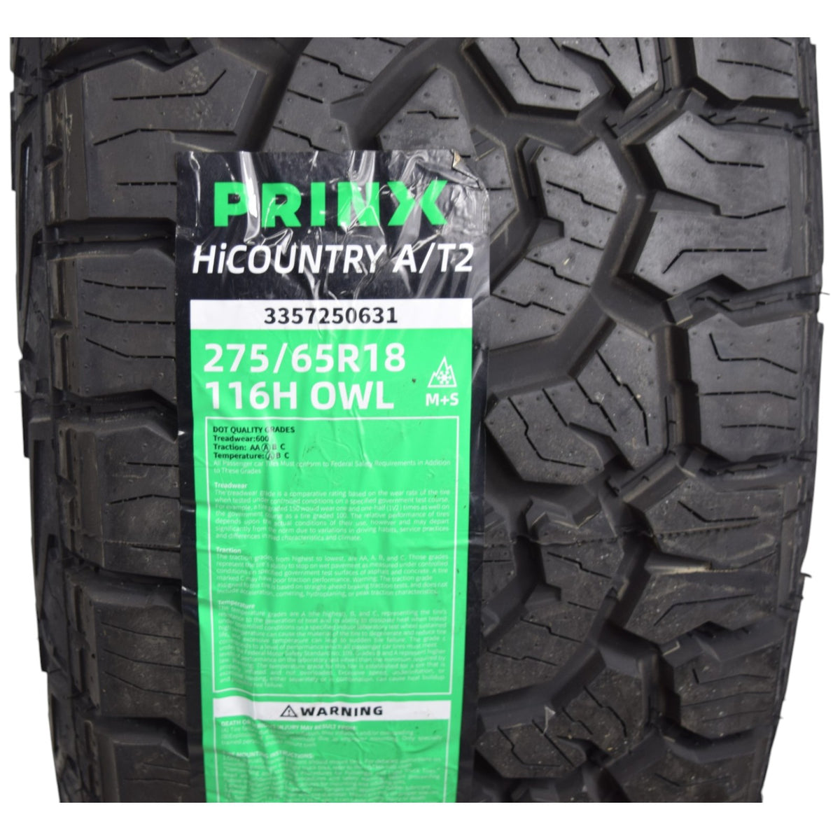 A black all-terrain tire with a green and white PRINX HICOUNTRY A/T2 sidewall label, photographed against a white background 275/65R18